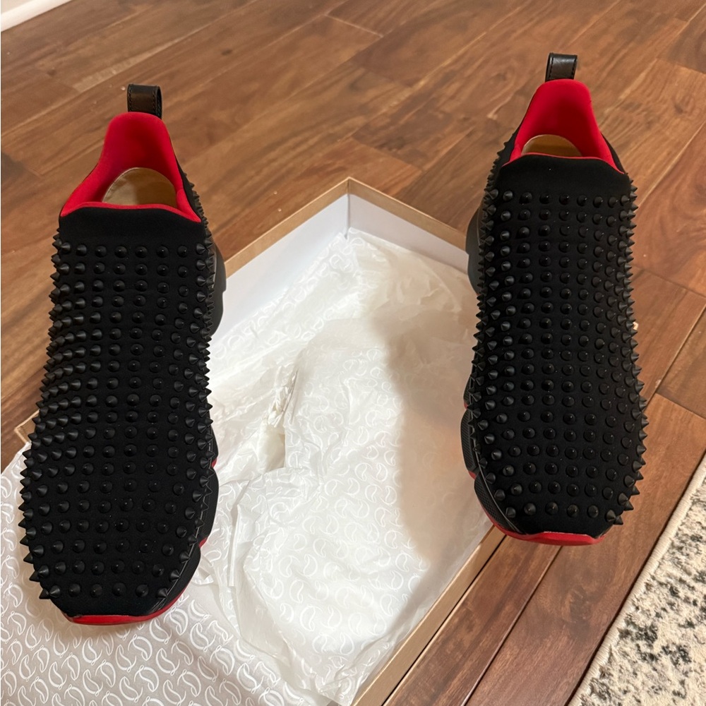 Christian Louboutin completely spiked and in almost new condition!